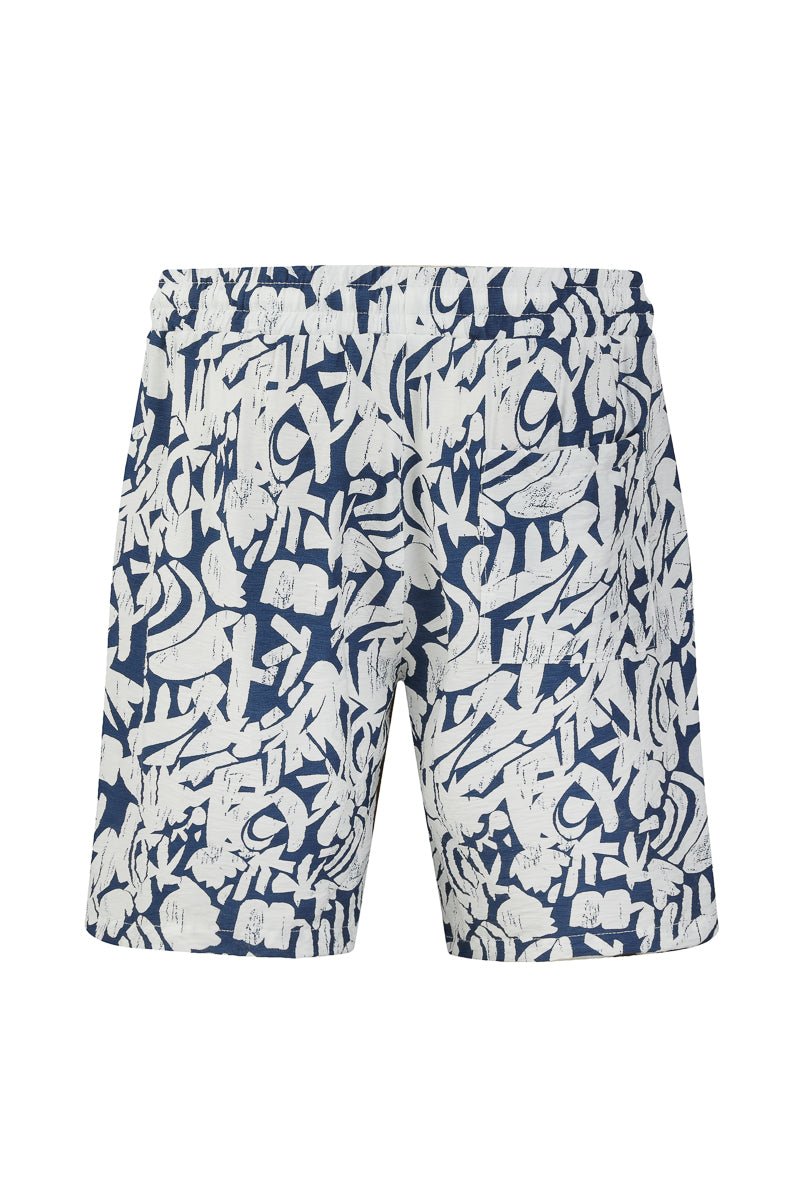 Ensemble short et chemise a motifs abstraits