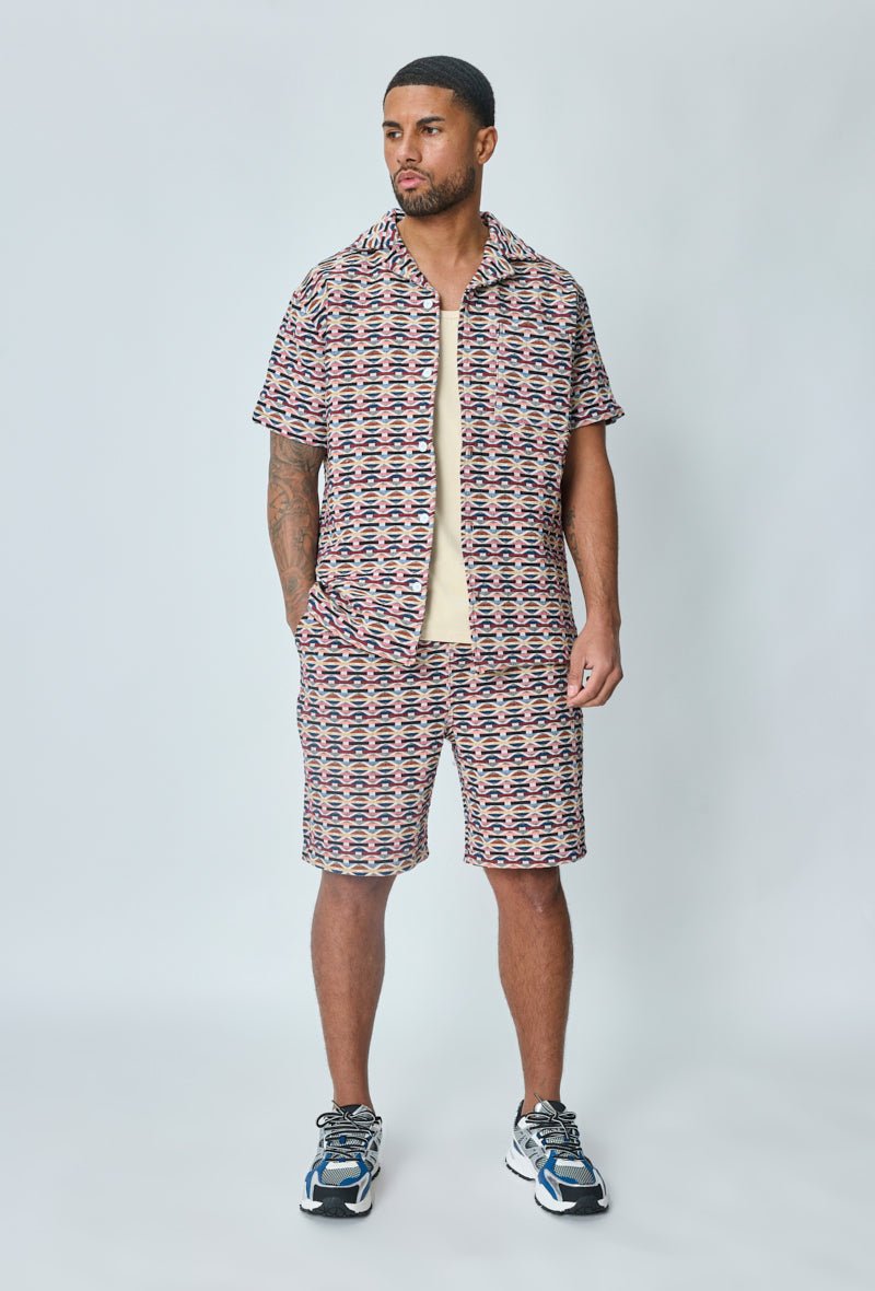 Ensemble short et chemise a motifs géométriques